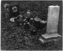 Most of the raves in the cemetery denoted by infor Most of the raves in the cemetery denoted by informal means, including ceramic objects, metal pipes, wooden stakes, offering vessels like glass jars a
